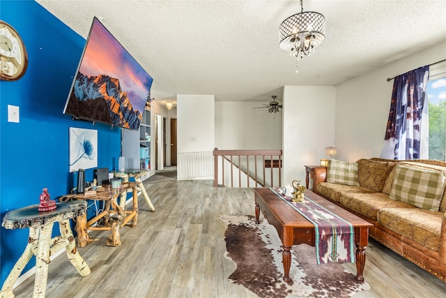 5900 Longview Dr, Missoula, MT 59803 - living room with a textured ceiling, wood finished floors, and a ceiling fan