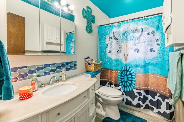 5900 Longview Dr, Missoula, MT 59803 - bathroom featuring toilet, tasteful backsplash, vanity, and a shower with curtain