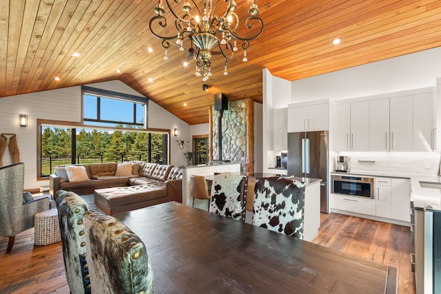 100 N Low Bench Rd, Gallatin Gateway, MT 59730 - dining space with wooden ceiling, a chandelier, high vaulted ceiling, and light wood finished floors