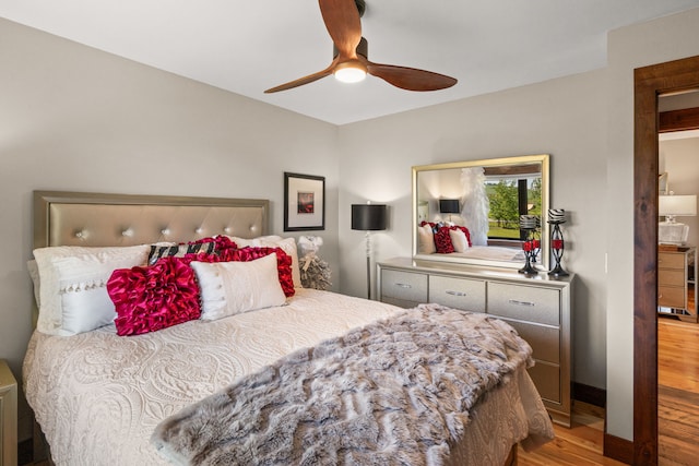 100 N Low Bench Rd, Gallatin Gateway, MT 59730 - bedroom featuring wood finished floors, ceiling fan, and baseboards