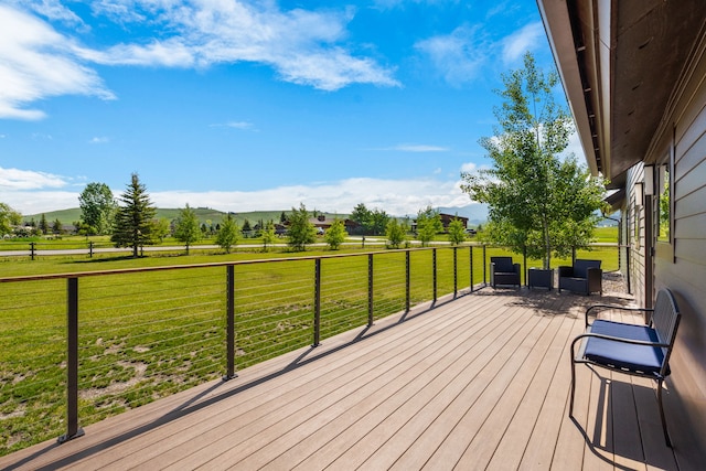 100 N Low Bench Rd, Gallatin Gateway, MT 59730 - wooden terrace with a yard, a mountain view, and a view of countryside