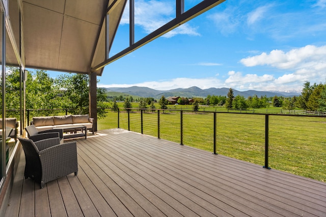 100 N Low Bench Rd, Gallatin Gateway, MT 59730 - wooden deck featuring an outdoor hangout area, a mountain view, and a view of countryside