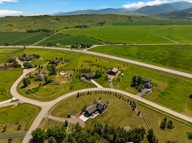 100 N Low Bench Rd, Gallatin Gateway, MT 59730 - aerial overview of property's location featuring rural landscape and a mountain backdrop