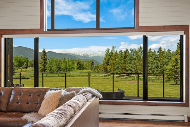 100 N Low Bench Rd, Gallatin Gateway, MT 59730 - detailed view of baseboard heating, wood walls, and a mountain backdrop