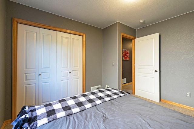 5334 Woodrow Ln, Lolo, MT 59847 - carpeted bedroom featuring baseboards and a closet