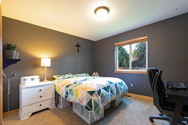5334 Woodrow Ln, Lolo, MT 59847 - bedroom featuring light carpet, a desk, and a textured wall