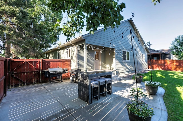 5334 Woodrow Ln, Lolo, MT 59847 - rear view of property featuring a fenced backyard and a wooden deck