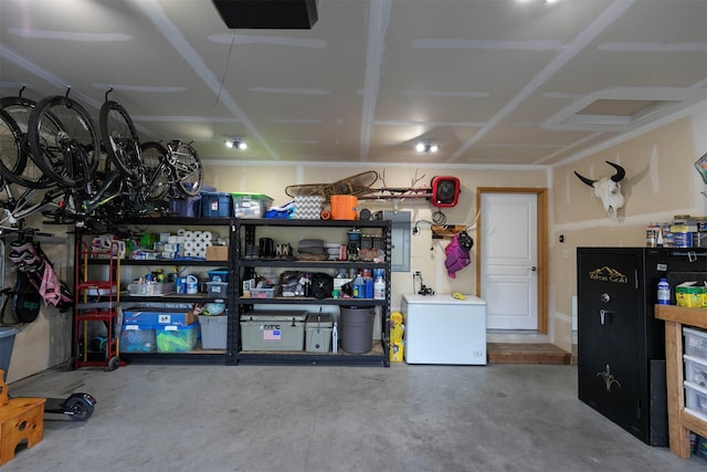 5334 Woodrow Ln, Lolo, MT 59847 - garage featuring fridge and electric panel