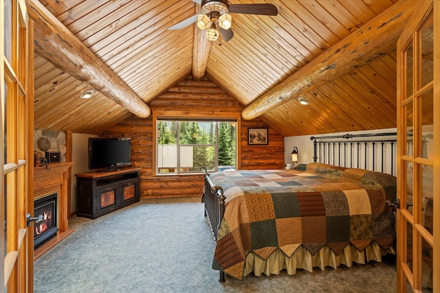 421 Swanson Lodge Rd, Troy, MT 59935 - carpeted bedroom with a fireplace, wood ceiling, and rustic walls