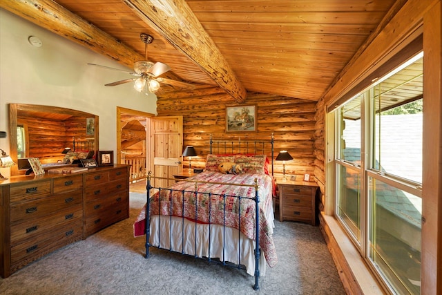 421 Swanson Lodge Rd, Troy, MT 59935 - carpeted bedroom with rustic walls and wood ceiling