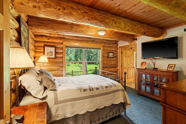 421 Swanson Lodge Rd, Troy, MT 59935 - carpeted bedroom with rustic walls and wood ceiling with exposed beams