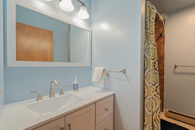 1520 Highland St, Helena, MT 59601 - bathroom with a baseboard heating unit, vanity, and curtained shower