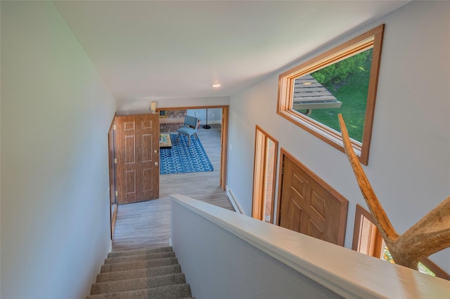 1520 Highland St, Helena, MT 59601 - hall featuring wood finished floors, baseboards, and stairs
