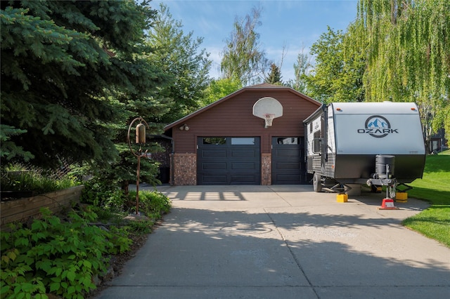 1520 Highland St, Helena, MT 59601 - view of front facade with an outdoor structure, driveway, and brick siding