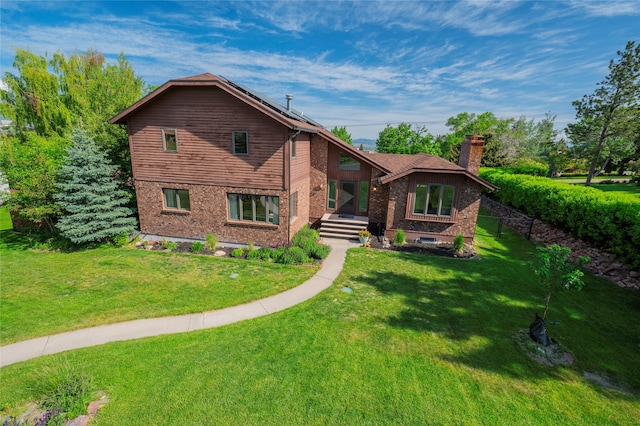1520 Highland St, Helena, MT 59601 - view of front of house with a chimney and a front lawn