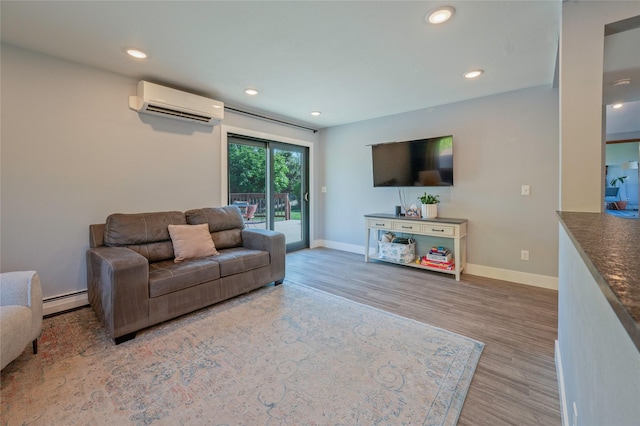 1520 Highland St, Helena, MT 59601 - living area featuring an AC wall unit, wood finished floors, baseboards, recessed lighting, and a baseboard radiator