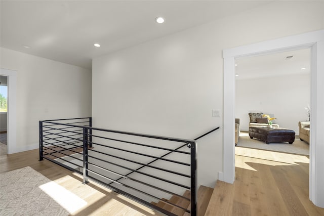 208 Cowboy Dr, Columbia Falls, MT 59912 - stairs featuring wood finished floors, recessed lighting, and baseboards