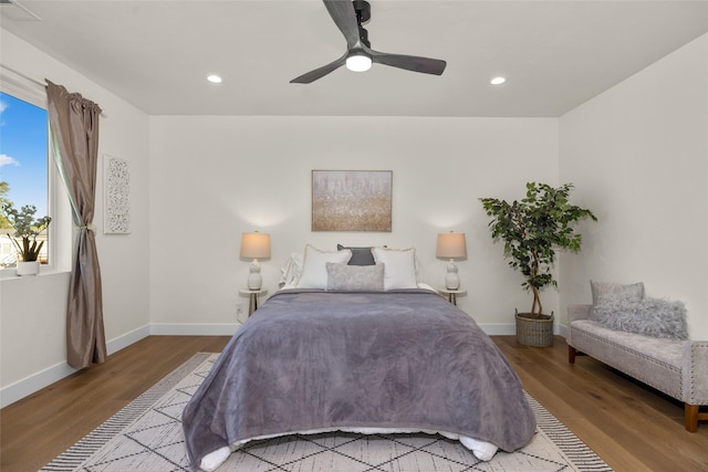 208 Cowboy Dr, Columbia Falls, MT 59912 - bedroom with wood finished floors, baseboards, recessed lighting, and ceiling fan