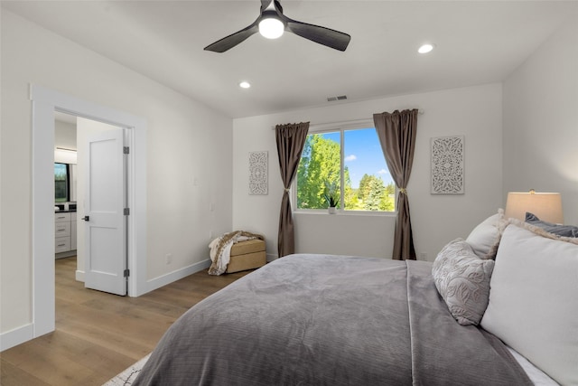 208 Cowboy Dr, Columbia Falls, MT 59912 - bedroom featuring light wood-style flooring, recessed lighting, ceiling fan, and baseboards