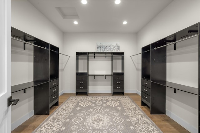 208 Cowboy Dr, Columbia Falls, MT 59912 - spacious closet with attic access and light wood-style floors