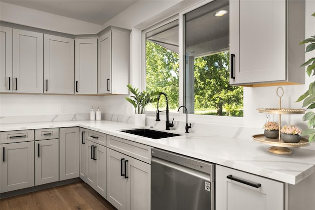 208 Cowboy Dr, Columbia Falls, MT 59912 - kitchen with a sink, dishwasher, gray cabinetry, and light stone counters
