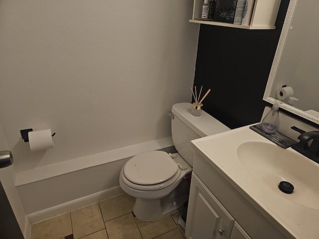 901 Rodgers St Unit 7, Missoula, MT 59802 - bathroom with toilet, vanity, tile patterned floors, and baseboards