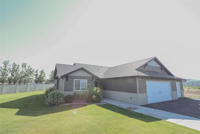 3075 Callaway Dr, East Helena, MT 59635 - single story home with asphalt driveway, a garage, and a shingled roof