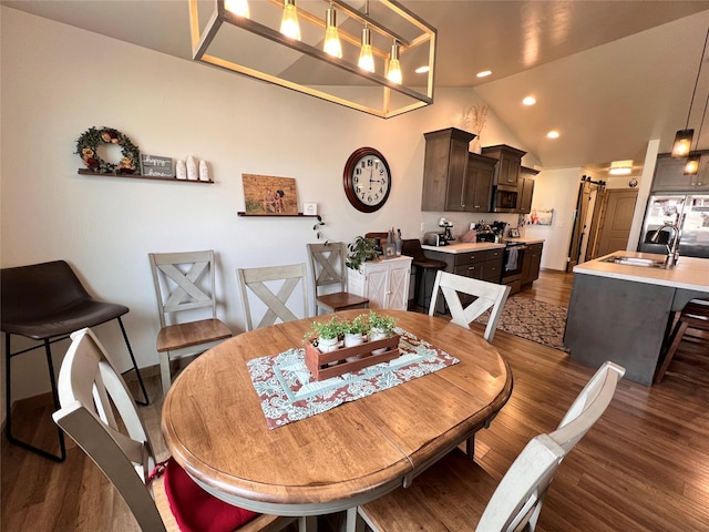 3075 Callaway Dr, East Helena, MT 59635 - dining room featuring dark wood finished floors, recessed lighting, and lofted ceiling