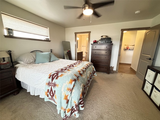 3075 Callaway Dr, East Helena, MT 59635 - carpeted bedroom with ceiling fan, ensuite bathroom, and baseboards