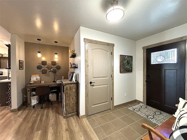 3075 Callaway Dr, East Helena, MT 59635 - foyer featuring baseboards and wood finished floors