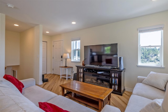 5196 Stallion Ridge Dr, Helena, MT 59602 - living area featuring wood finished floors, baseboards, and recessed lighting