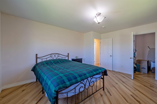 5196 Stallion Ridge Dr, Helena, MT 59602 - bedroom featuring light wood-style flooring and baseboards