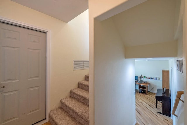 5196 Stallion Ridge Dr, Helena, MT 59602 - stairs featuring wood finished floors