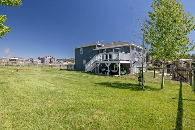 5196 Stallion Ridge Dr, Helena, MT 59602 - rear view of property featuring a deck, stairway, and a gate
