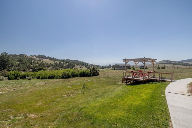5196 Stallion Ridge Dr, Helena, MT 59602 - view of grassy yard featuring a pergola