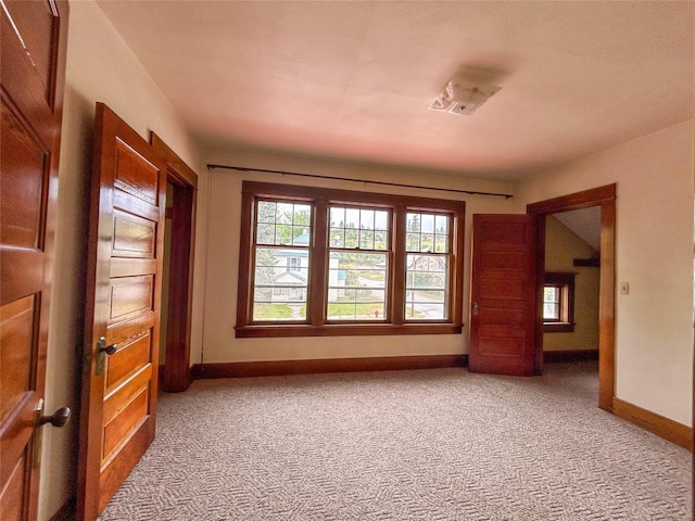 412 1st Ave E, Eureka, MT 59917 - unfurnished room featuring light carpet and baseboards