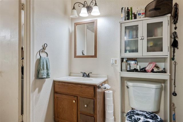 424 4th Ave, Victor, MT 59875 - bathroom with vanity and toilet