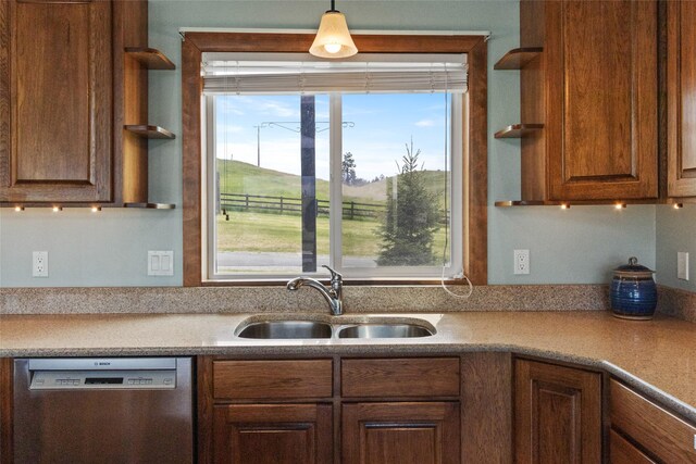 760 Lundeen Rd, Eureka, MT 59917 - kitchen with open shelves, stainless steel dishwasher, a sink, and light countertops