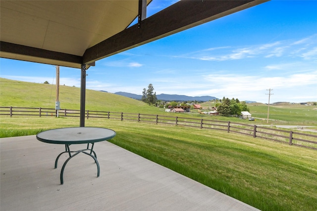760 Lundeen Rd, Eureka, MT 59917 - view of patio / terrace featuring a rural view and a mountain view