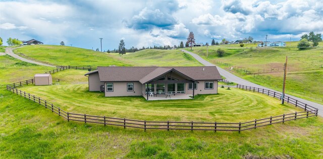 760 Lundeen Rd, Eureka, MT 59917 - back of property featuring a view of countryside and a patio area