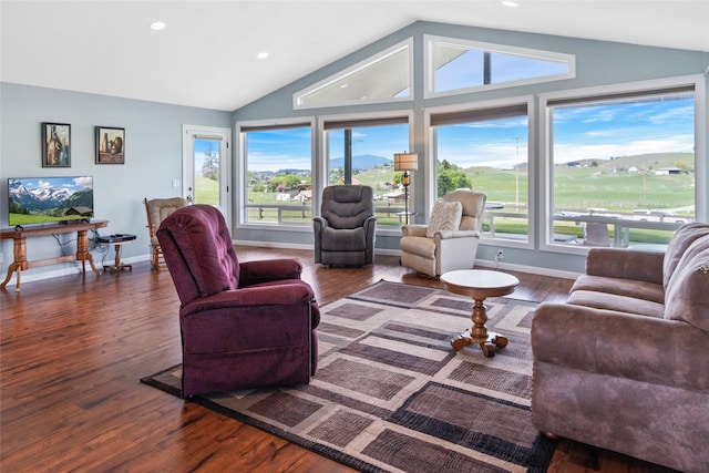 760 Lundeen Rd, Eureka, MT 59917 - living area featuring lofted ceiling, wood finished floors, recessed lighting, and baseboards