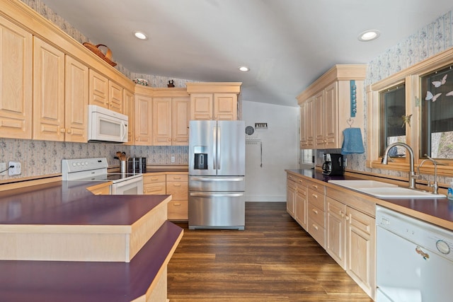 21347 Hydeaway Rd, Rollins, MT 59931 - kitchen featuring white appliances, wallpapered walls, light brown cabinets, dark wood-style flooring, and dark countertops