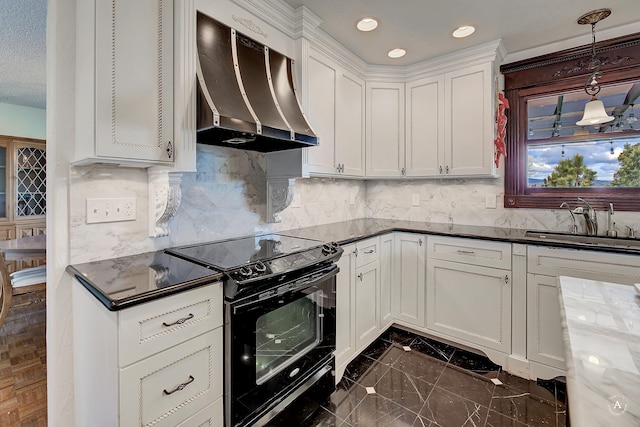 1644 Gold Rush Ave, Helena, MT 59601 - kitchen featuring under cabinet range hood, black range with electric stovetop, a sink, decorative backsplash, and recessed lighting