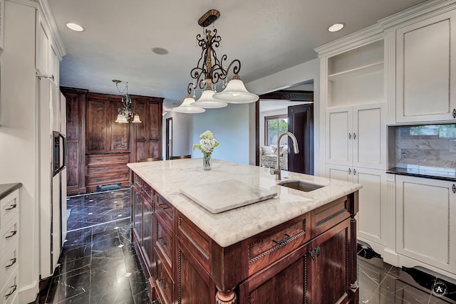 1644 Gold Rush Ave, Helena, MT 59601 - kitchen with a sink, a center island with sink, recessed lighting, tasteful backsplash, and pendant lighting