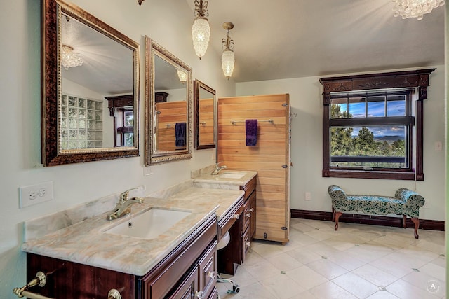 1644 Gold Rush Ave, Helena, MT 59601 - full bath with double vanity, baseboards, lofted ceiling, and tile patterned flooring