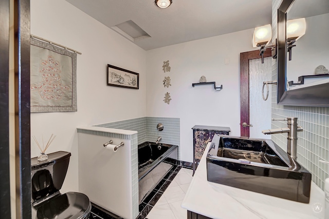 1644 Gold Rush Ave, Helena, MT 59601 - full bathroom featuring a garden tub, toilet, tile patterned flooring, and vanity