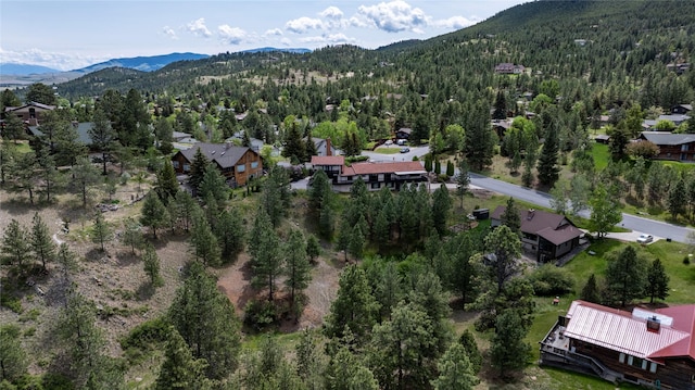 1644 Gold Rush Ave, Helena, MT 59601 - aerial view of residential area featuring a mountain backdrop and a heavily wooded area