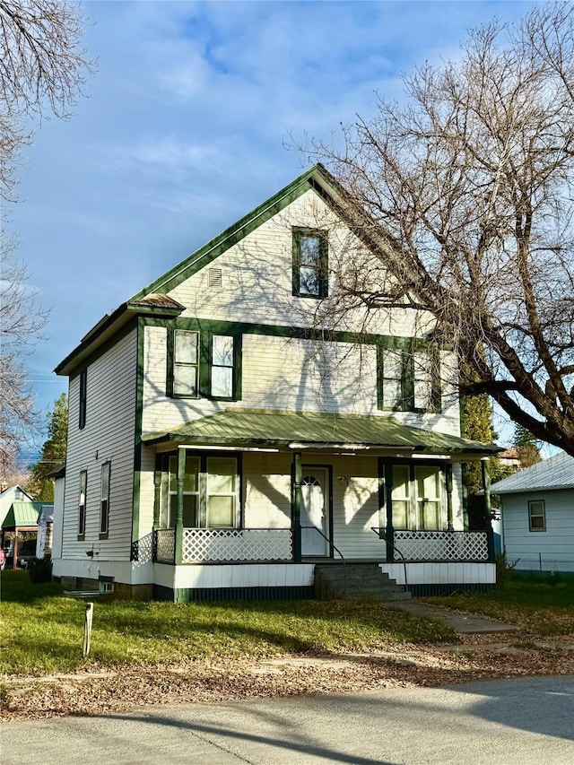506 1st Ave E Unit A, B, C, Eureka, MT 59917 - view of front facade featuring a porch