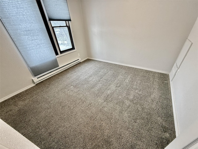 506 1st Ave E Unit A, B, C, Eureka, MT 59917 - empty room with carpet flooring, baseboard heating, and baseboards