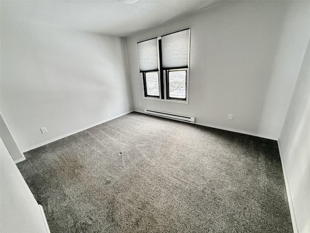 506 1st Ave E Unit A, B, C, Eureka, MT 59917 - unfurnished room featuring a baseboard radiator, carpet, and baseboards
